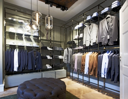 concept house with bistro - development and realization - Roy Robson Lüneburg - room structure - clothing presentation - pouf - lamps