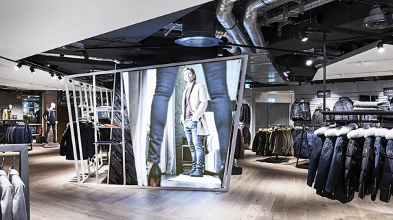 Men's Fashion Store - conception - realisation - Wormland Nuremberg - store overview - central dispay area - poster wall